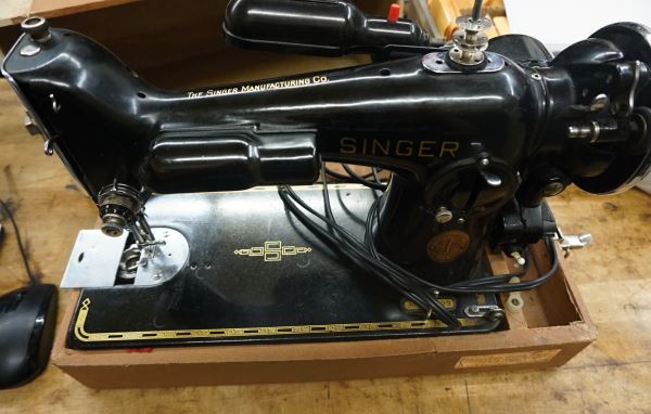 Sold at Auction: A Singer Sewing Machine in a Case, model no. 201P