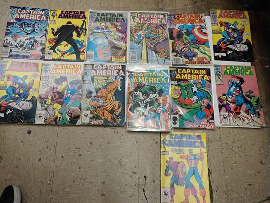 Picture of LOT 13 CAPTAIN AMERICA MARVEL COMICS 317  MAY; 324 DECEMBER;  310 OCTOBER; 312 DECEMBER;  316 APRIL; 328 APRIL;  325 JANUARY;  313 JANUARY;  292 APRIL;  331 JULY;  306 JUNE; 309 SEPTEMBER. GOOD CONDITION. COLLECTIBLE.