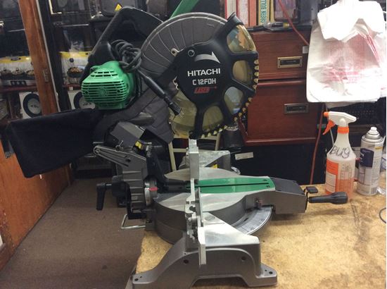 Picture of Hitachi miter saw power tool CH12FDH 12” compound used . Tested. In a good working order. 