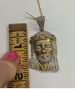 Picture of 10kt yellow gold Jesus head pendant with diamonds 