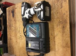 Picture of Makita titAnium drill 18v with a batt  BL1815and 1 chArger DC18RC  LxOdf1 Used .tested. In a good working order.79.95