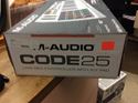 Picture of M-audio mixing board midi control code 25 new . In box .