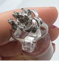 Picture of  14kt white  gold antique ring 4.9 gr 7 diamonds ( 1 diamond 25pts ) w 6 diamonds 0.03 pts  total weight 43pts .each size 7.5. 