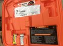 Picture of Paslode nail gun with battery case manual used.tested. 842605-2 