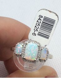 Picture of 14kt white gold fashion ring with 0.25 carat of 40 round diamonds and 3 beautiful opals. Size 9.5 . 3.3 gr . 842525-6. 