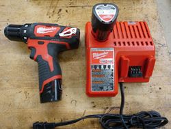 Picture of Milwaukee 2407-20 3/8" 12V Drill/Driver With 2 Batteries 48-11-2401 And Charger 48-59-1812. used. tested. in a good working order. very good condition.