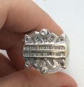 Picture of 14kt white gold men’s ring 12.4 gr size 6 with 6 round diamonds 42 baguettes 0.50 carAt total 838431-1 