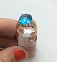 Picture of 10kt yellow gold ladies ring size 6.75 3.9gr with 4 small diamonds and blue stone 848960-1 