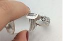 Picture of 14kt white gold ring size 7.25 with 4 small diamonds and 3 light blue oval stones 2.7 gr 803093-1 