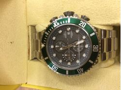 Picture of Invicta stainless steel watch with green bezel 200 meters water resistant Pre owned mint 850019-1 