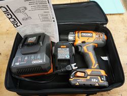 Picture of RIDGID R860052K 18V LITH-ION Cordless Compact Drill/Driver KiT WITH 2 R840085 BATTERIES; R86092 CHARGER ; CASE; MANUAL. New. OUT OF BOX.