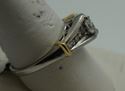 Picture of PLATINUM ENGAGEMENT RING 9.4GR WITH YELLOW GOLD AND DIAMONDS 0.50PTS (1 MARQUISE DIAMOND 0.20PTS 9 ROUND DIAMONDS 0.30PTS). SIZE 9.5. PRE OWNED. GOOD CONDITION.  837438-1.