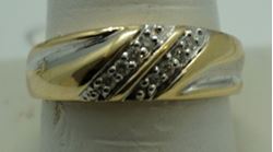 Picture of 14kt yellow gold ring size 10 with 8 diamonds 0.10 total diamond weight . Total weight 4gr. Pre owned. 846228-1 