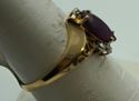 Picture of 10kt yellow gold ring with red margie stone size 8.25 2.0gr very good condition . pre owned. 852046-1. 