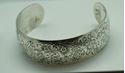 Picture of S KIRK AND SON FLOWER ENGRAVED BANGLE STERLING SILVER CUFF BRACELET .38.4 GRAM. VERY GOOD CONDITION. PRE OWNED. 852279. 