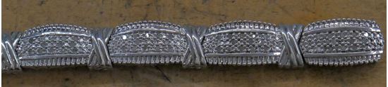 Picture of STERLING SILVER LADIES TENNIS STYLE BRACELET 21.9GR W 1 CTW DIAMONDS (130 DIAMONDS TOTAL); 7.5 INCHES . PRE OWNED. VERY GOOD CONDITION. 852561-2. 