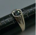 Picture of 10kt yellow gold ring 4.4 gram with blue oval stone size 10.5 pre-owned. very good condition.