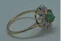 Picture of 14KT YELLOW GOLD FASHION RING SIZE 6.5 2.8 GRAMS WITH EMERALD OVAL STONE AND 12 ROUND DIAMONDS.  PRE OWNED. VERY GOOD CONDITION. 851806-1.