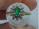 Picture of 14KT YELLOW GOLD FASHION RING SIZE 6.5 2.8 GRAMS WITH EMERALD OVAL STONE AND 12 ROUND DIAMONDS.  PRE OWNED. VERY GOOD CONDITION. 851806-1.