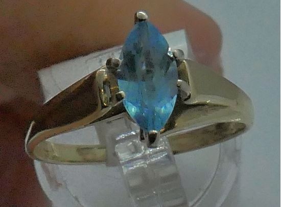 Picture of 14KT YELLOW GOLD FASHION RING WITH LIGHT MARQUISE BLUE STONE SIZE 8.75 3.4 GRAMS. PRE OWNED. VERY GOOD CONDITION. 852678-1.