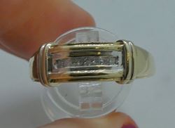 Picture of 10KT YELLOW GOLD MEN'S RING SIZE 10.75 ;6.5 GRAMS;7 PRINCESS CUT DIAMONDS 0.25 CARAT.  PRE OWNED. VERY GOOD CONDITION. 851900-1.