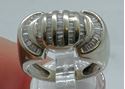 Picture of 10kt white gold fashion ring size 7; 7.8 grams ;with 1 carat baguette diamonds. pre owned. very good condition. 813344-1.
