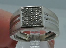 Picture of 10kt white gold men's ring w diamonds; 6.8 grams; 0.75 carat of round diamonds; size 9.5. pre owned . very good condition. 840013-1.