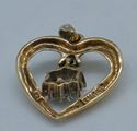 Picture of 10kt yellow gold heart pendant with 7 small round diamonds 2.1 grams 843375-2
