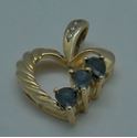 Picture of 10kt yellow gold heart pendant with 3 small diamonds and blue stones 2.4 grams  849283-3