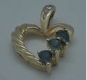 Picture of 10kt yellow gold heart pendant with 3 small diamonds and blue stones 2.4 grams  849283-3
