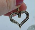 Picture of 10kt yellow gold heart pendant with baquette diamonds (0.25pts) 2.1 grams 818010-1