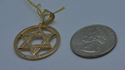 Picture of 10kt yellow gold pendant "star of David " 3.9 grams with czs 849988-2