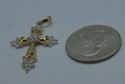 Picture of 10kt yellow gold pendant cross 2.5 grams with 0.15pts of diamonds 848865-1