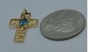 Picture of 10kt yellow gold cross with light blue stone 1.2 grams 842708-1