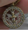 Picture of 10kt yellow gold pendant with angel ( czs ) 3.1 grams 851832-2