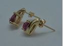 Picture of 14kt yellow gold earrings with red stones 2.1 grams 842874-3