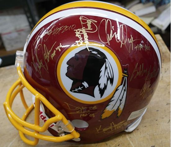 Picture of WASHINGTON REDSKINS SIGNED TEAM REPLICA NFL HELMET WITH COA COLLECTIBLE.  VERY GOOD CONDITION. 